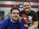 Gavin Casey, 10, and his pal Taurin Gregoris, 20, a staff member at Variety Village, play Yu-Gi-Oh! together every day at the Scarborough sports complex that caters to kids with disabilities. (photo by Erin Rivet)