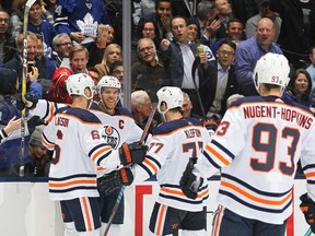 Connor McDavid #97 of the Edmonton Oilers celebrates a goal against the Toronto Maple Leafs during an NHL game at Scotiabank Arena on January 6, 2020 in Toronto. The Oilers defeated the Maple Leafs 6-4. (Photo by Claus Andersen/Getty Images)