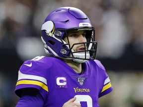 Kirk Cousins of the Minnesota Vikings looks on against the New Orleans Saints in the NFC Wild Card Playoff game at Mercedes Benz Superdome on January 5, 2020 in New Orleans, Louisiana.