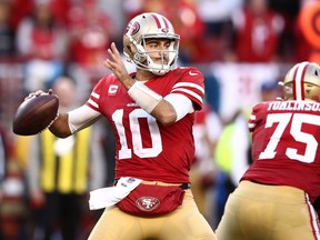 Jimmy Garoppolo of the San Francisco 49ers drops back to pass during the second half against the Minnesota Vikings during the NFC Divisional Round Playoff game at Levi's Stadium on January 11, 2020 in Santa Clara, California.