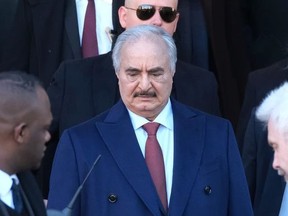 Libyan Field Marshall Khalifa Haftar steps into a limousine as he departs from the Hotel de Rome on January 21, 2020 in Berlin, Germany.