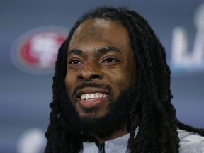 Richard Sherman of the San Francisco 49ers speaks to the media during the San Francisco 49ers media availability prior to Super Bowl LIV at the James L. Knight Center on January 29, 2020 in Miami, Florida.