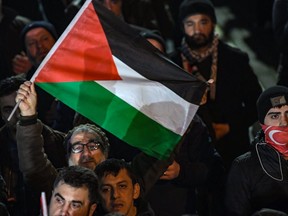 Protesters take part in a demonstration in front of the U.S. Consulate in Istanbul on Jan. 28, 2020, to protest against President Donald Trump's peace plan for the Middle East. (AFP via Getty Images)