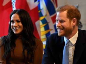 Britain's Prince Harry and his wife, Meghan, Duchess of Sussex, visit Canada House in London, Britain on January 7, 2020. (Reuters)