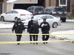 Peel Regional Police officers are pictured Wednesday as they investigate Peel Region's  31st homicide of 2019. A 17-year old boy was shot dead late Tuesday. (Jack Boland, Toronto Sun)