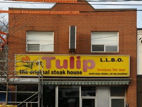 The iconic Tulip, located at Queen St. E and Coxwell Ave., has closed its doors. (Jack Boland, Toronto Sun)