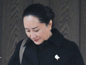 Huawei Chief Financial Officer Meng Wanzhou leaves her Vancouver home to go to her extradition hearing in Vancouver on Jan. 22, 2020.