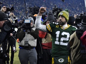 Quarterback Aaron Rodgers and the Green Bay Packers are 7.5-point underdogs against San Francisco on Sunday. (GETTY IMAGES)