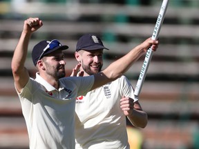 England's Mark Wood celebrates with a stump after winning the test and series against South Africa on Monday. (REUTERS)
