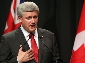 This November 14, 2015 file photo shows Canada's Prime Minister Stephen Harper as he speaks during a joint press conference with New Zealand's prime minister in Auckland.