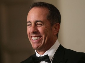 Comedian Jerry Seinfeld speaks to members of the media as he arrives at the White House for a state dinner October 18, 2016 in Washington, DC. U.S.
