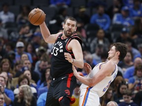 Jan 15, 2020; Oklahoma City, Oklahoma, USA; Toronto Raptors center Marc Gasol (33) grabs a pass against Oklahoma City Thunder forward Mike Muscala (33) during the second half at Chesapeake Energy Arena. Toronto won 130-121. Mandatory Credit: Alonzo Adams-USA TODAY Sports ORG XMIT: USATSI-407326