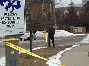 Peel Regional Police remove the crime scene tape after gunfire erupts for the second time in 24 hours on Acorn Pl. in Mississauga on Thursday, Jan. 30, 2020. (Kevin Connor/Toronto Sun/Postmedia Network)