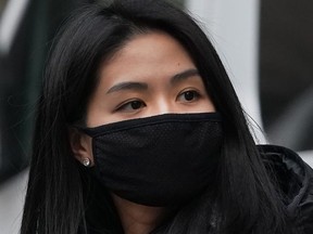 A woman wears a protective mask near the Chinatown section of New York City on January 23, 2020.