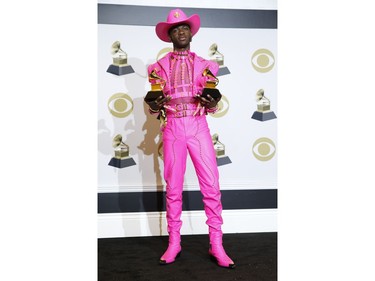 Nas X poses backstage with his Best Music Video and Best Pop Duo/Group Performance awards for "Old Town Road" at the 62nd Grammy Awards in Los Angeles, California, U.S., on January 26, 2020.