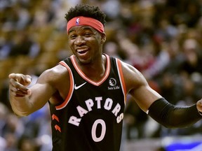 Toronto Raptors guard Terence Davis laughs during second half NBA basketball action against the Orlando Magic, in Toronto, Wednesday, Nov. 20, 2019.