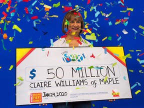 Claire Williams, of Maple, Ont., is pictured with the big cheque for her $50-million jackpot from the Jan. 17, 2020, draw at the OLG Prize Centre in Toronto.