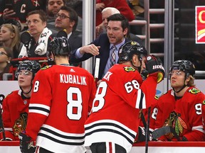 Chicago Blackhawks head coach Jeremy Colliton gives instructions to his team during a game in late December. (Jonathan Daniel/Getty Images)