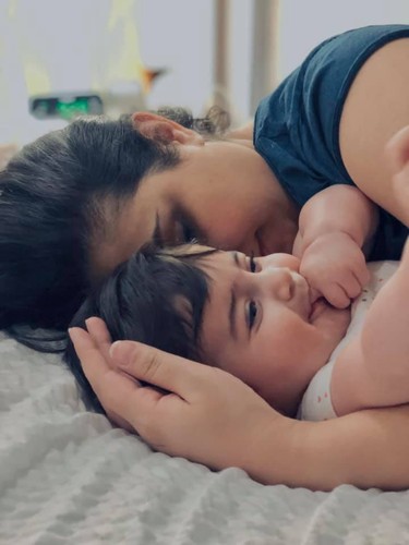 Ajax mom Evin Arsalani cuddles her baby Kurdia in an undated Facebook photo. The pair were killed in the plane crash in Iran.