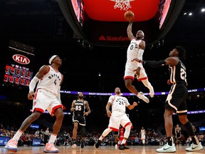 Raptors’ Terence Davis dunks during Monday’s win over the Hawks in Atlanta. (GETTY IMAGES)