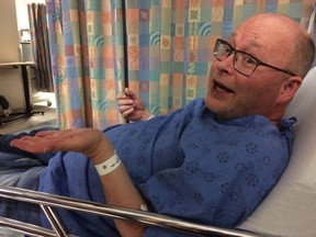 Mike Sloan, in London's University Hospital after suffering a stroke on Oct. 15, 2019. Sloan passed away Monday at the age of 50.