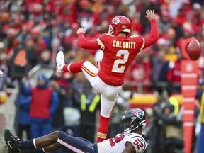 Houston Texans linebacker Barkevious Mingo blocks a punt by Kansas City Chiefs punter Dustin Colquitt during the first quarter in a AFC Divisional Round playoff football game at Arrowhead Stadium.