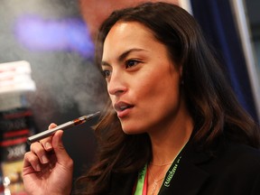 NEW YORK, NY - JUNE 16:  Jordan Michelle vapes a CBD oil made from hemp at the Cannabis World Congress Conference on June 16, 2017 in New York City. Billed as "the leading trade show and conference for the legalized cannabis, medical marijuana, and industrial hemp industries," the 4th annual conference brings together dozens of both small and large businesses involved in the growing hemp and marijuana market.  (Photo by Spencer Platt/Getty Images)