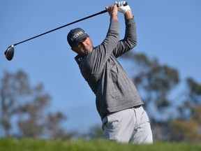 Ryan Palmer plays his shot from the 14th tee during the second round of the Farmers Insurance Open golf tournament at Torrey Pines Municipal Golf Course - North Course.