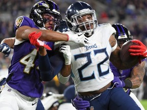 Last week, against the 
No. 1 seed Baltimore Ravens and their No. 4-rated “D,” Tennessee Titans running back Derrick Henry (right) had 30 carries for 195 yards in a 28-12 upset win. The Chiefs defence is ranked eighth.
 (Getty Images)