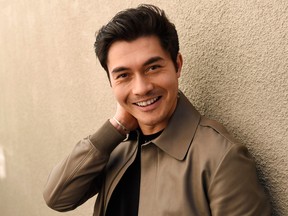 Henry Golding poses for a portrait at the Orlando Hotel in Los Angeles. Golding, who starred in the hit film, Crazy Rich Asians, plays the villain in Guy Ritchie’s The Gentlemen. (Chris Pizzello/AP)