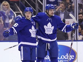Toronto Maple Leafs forward Auston Matthews celebrates his goal against the Winnipeg Jets with forward Mitchell Marner during the first period at Scotiabank Arena.