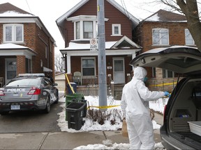Three days after Giulia Matthews, 54, was found dead in her home on Atlas Ave., northeast of Oakwood Ave. and St. Clair Ave. W., investigators deemed her death a homicide and forensics officers were at the scene gathering evidence on Thursday, Jan. 23, 2020. (Chris Doucette/Toronto Sun/Postmedia Network)
