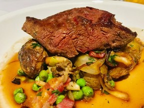 Braised beef with bacon, brussels sprouts and peas at Ciel! Bistro-Bar in Quebec City.