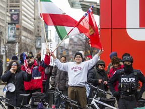 Demonstrators in support of the United States across the street from the U.S. Consulate General in Toronto on Saturday, Jan. 4, 2020. (Ernest Doroszuk/Toronto Sun/Postmedia Network)