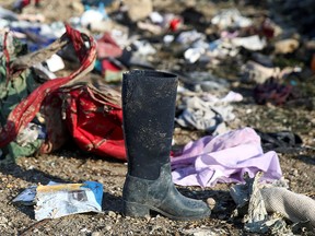 Passengers' belongings are pictured at the site where the Ukraine International Airlines plane crashed after take-off from Iran's Imam Khomeini airport, on the outskirts of Tehran, Iran Jan. 8, 2020.