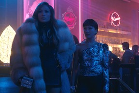 Jennifer Lopez, with Constance Wu, in a scene from Hustlers.