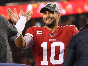 Jimmy Garoppolo of the 49ers celebrates after winning the NFC Championship Game against the Packers at Levi's Stadium in Santa Clara, Calif., on on Jan. 19, 2020.