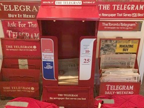 Reader Keith Rowe sent me this photo of a portion of his fascinating collection of newspaper memorabilia. The late, lamented Toronto Telegram was a favourite of his as confirmed by his selection of Tely boxes and newsboys’ (and newsgirls’) delivery bags.
