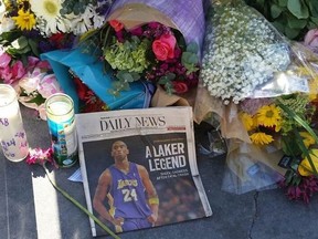Make-shift memorials have sprung up outside the Staples Center and across Los Angeles since NBA legend Kobe Bryant, 41, his daughter Gianna, 13, and seven others were killed in a helicopter crash in California on Sunday, Jan. 26, 2020. (Rita DeMontis/Toronto Sun/Postmedia Network)