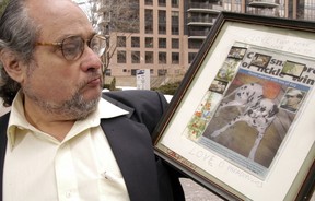Harry Kopyto holds up a photo of Demetre Papadopoulos’ dog Pluto, a pooch that was put up for adoption by the Humane Society while its owner was on a trip to Greece, which led to a lawsuit in 2005. (Sun files)