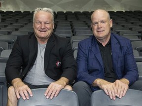 The Hunter brothers Dale (left) and Mark will be helming Canada's national junior hockey team. Photo shot in London, Ont. on Thursday July 25, 2019.