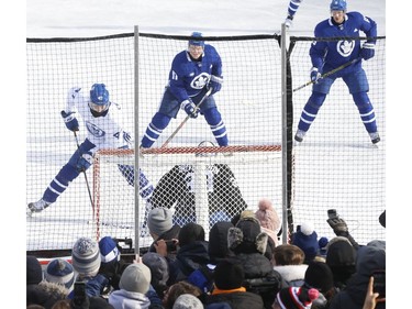 Toronto Maple Leafs held their annual outdoor practice at Nathan Phillips Square (Pictured) Toronto Maple Leafs Pierre Engvall LW (47) comes in on goalieMichael Hutchinson in Toronto on Thursday January 9, 2020. Jack Boland/Toronto Sun/Postmedia Network