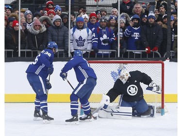 Toronto Maple Leafs held their annual outdoor practice at Nathan Phillips Square (Pictured) David Ayres makes a save on a Zach Hyman (11) backhand  in Toronto on Thursday January 9, 2020. Jack Boland/Toronto Sun/Postmedia Network
