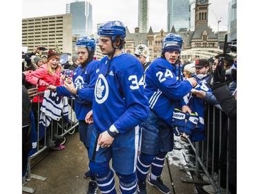 Toronto Maple Leafs (from left) William Nylander, Auston Matthews and Kasperi Kapanen sign autographs following the team's annual outdoor skate at Nathan Philips Square in Toronto, Ont. on Thursday January 9, 2020. Ernest Doroszuk/Toronto Sun/Postmedia
