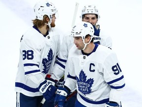 Maple Leafs captain John Tavares (centre) likes playing alongside William Nylander (left). “You have a lot of trust when you give it to him, and then I think we just read off each other well,” he says. (USA TODAY)