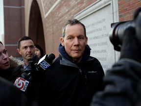 Dr. Charles Lieber leaves federal court after he was charged with lying to the federal authorities in connection with aiding China, at Harvard University in Cambridge, Massachusetts, U.S. January 30, 2020. (REUTERS/Katherine Taylor)