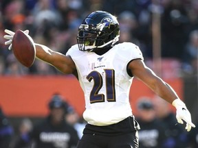 Ravens running back Mark Ingram celebrates a first down against the Browns during the NFL action at FirstEnergy Stadium in Cleveland, Dec. 22, 2019.