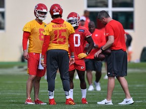 Patrick Mahomes speaks with Matt Moore (8) and Tyreek Hill during the Kansas City Chiefs practice prior to Super Bowl LIV at Baptist Health Training Facility at Nova Southern University on January 31, 2020 in Davie, Florida. (Mark Brown/Getty Images)