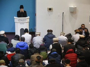 Members of the Ahmadiyya Muslim Jama'at Canada community held a special remembrance for the victims of Ukranian Airlines flight 752, which was shot down near Tehran, Iran, during their prayer session at the Baitul Islam Mosque in Vaughan on Saturday, Jan. 11, 2020. (Jack Boland/Toronto Sun/Postmedia Network)