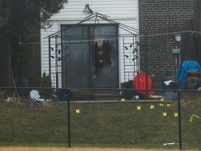 A man, 25, was killed by gunshots fired through a glass patio door into a townhouse at 367 Military Tr., in Scarborough, on Saturday, Jan. 12, 2020. (Jack Boland/Toronto Sun/Postmedia Network)